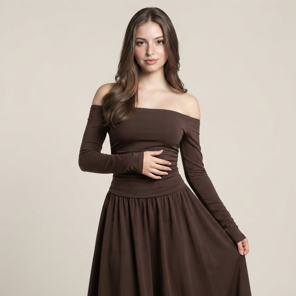 Woman wearing a solid dark brown off-the-shoulder long-sleeve maxi dress with ruched bodice, beige studio background.