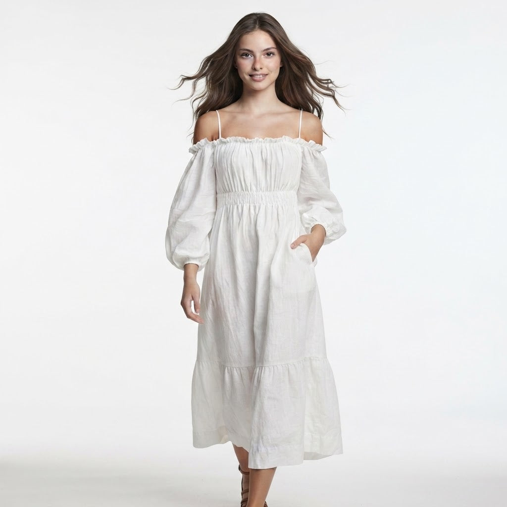 Woman modeling a white off-shoulder midi dress with balloon sleeves, smocked bodice, and side pockets, white background.