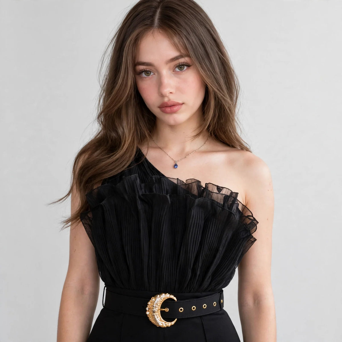 One-shoulder ruffle jumpsuit on model, three-quarter view