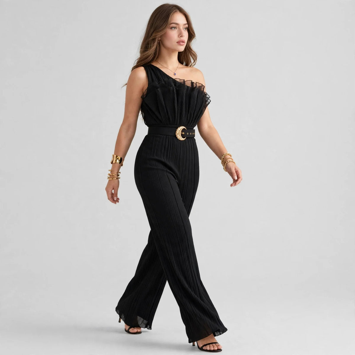 One-shoulder ruffle jumpsuit on model, close-up detail