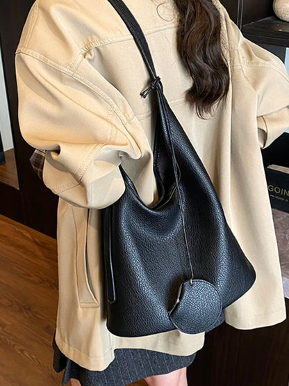 Structured Solid-Color PU Leather Handbag – Side View | Celina Studio