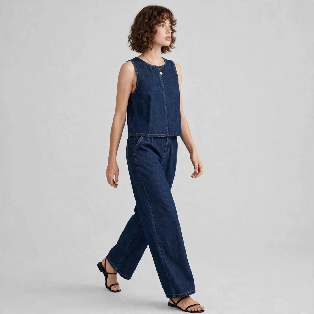 Dark Blue Denim tank and pants set on model, three-quarter view