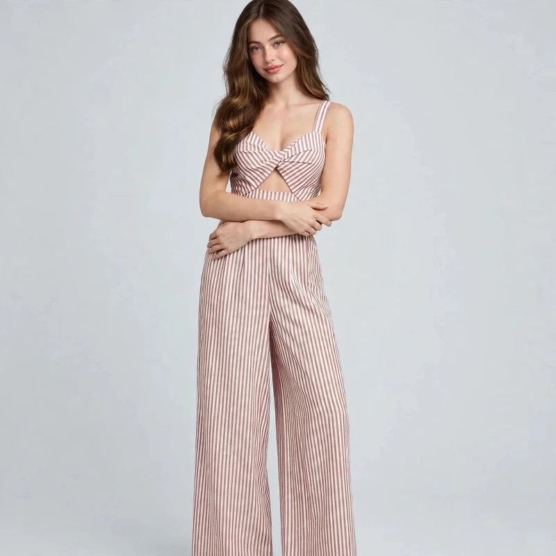 Blush Pink Striped cutout jumpsuit on model, styled studio pose