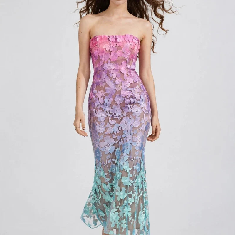 Front view of a pink-to-mint ombré floral embroidered strapless maxi dress with fitted bodice, white studio background.