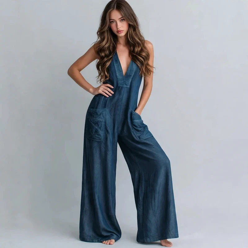 V-neck wide-leg jumpsuit on model, styled studio pose